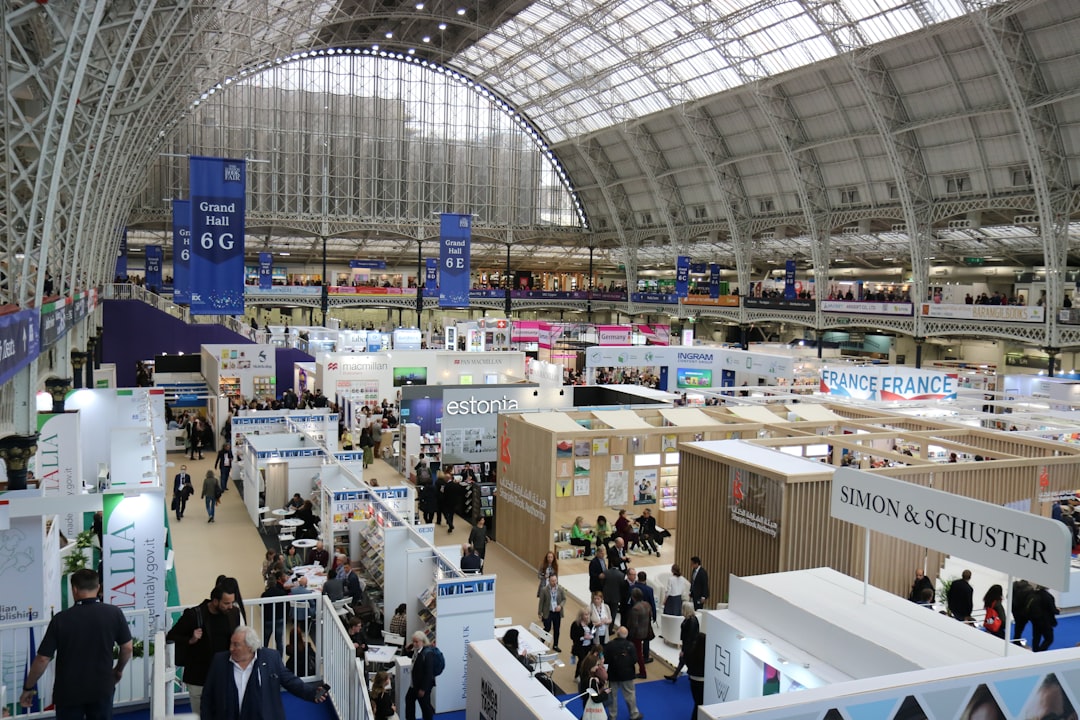 Crowd walking through an exhibition hall