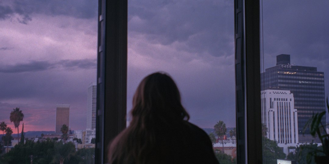 Silhouette looking at a city skyline